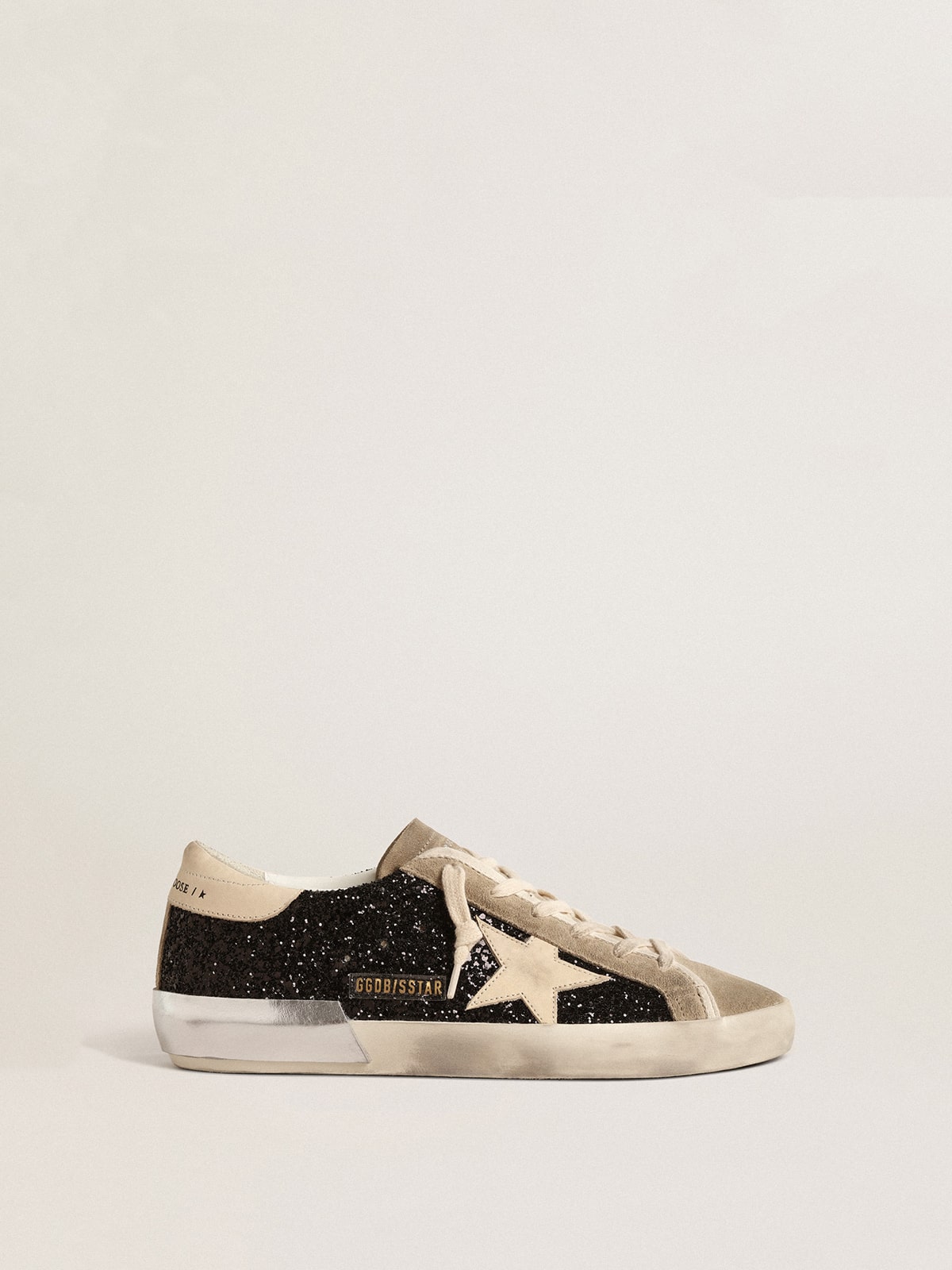 Golden Goose Sneaker | Super-Star Sneaker mit schwarzem Glitzer und beigem Stern | GWF00587.F004683.90401 / ADAM/EVE